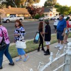 Ice cream lovers waiting in line for ice cream at the Sarah Mooney Museum.